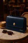 DiwaKi Heritage Muse Handbag – Luxury Leather Satchel with Gold African Emblem